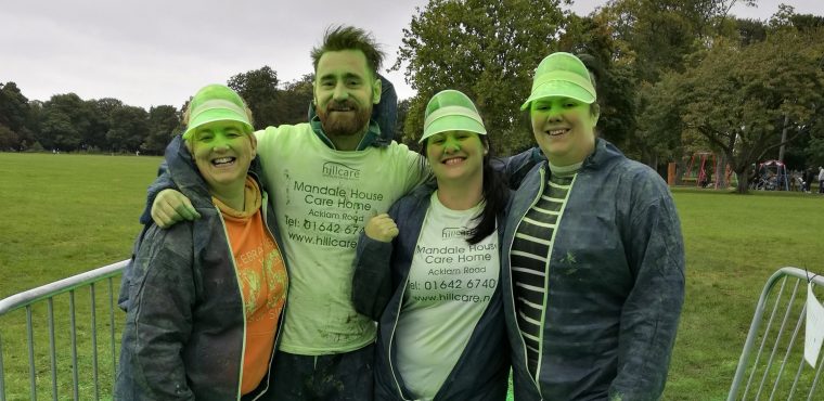  Runners get greened at Hill Care gate in Colour Run 